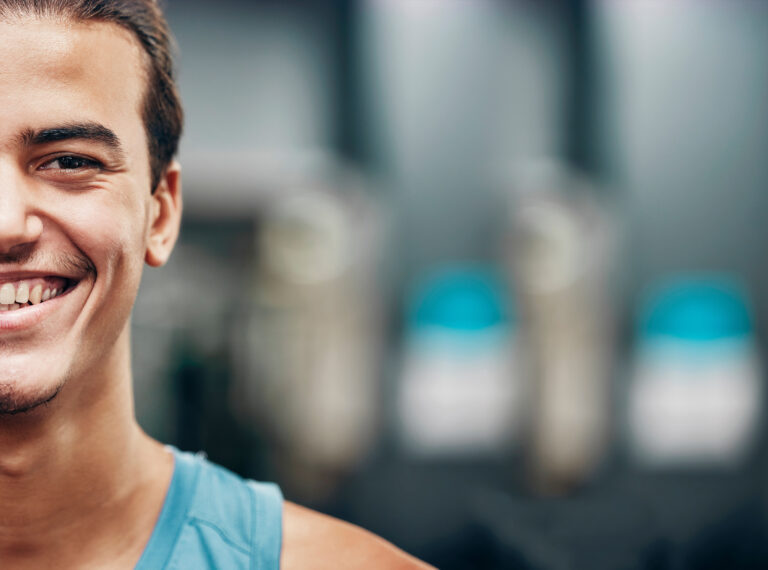 Fitness guy smiling